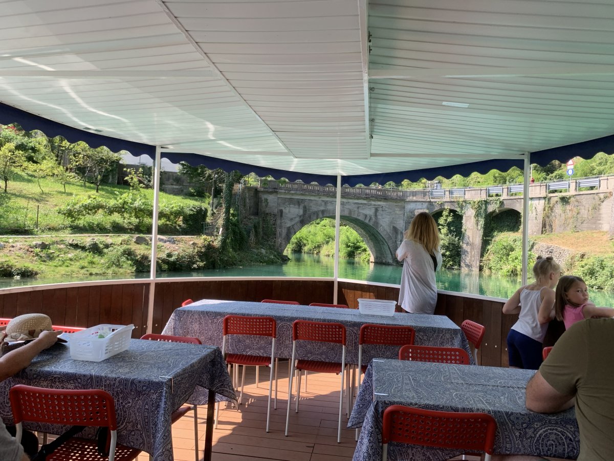 The boat ride starts by going under this bridge to an exclusive part of the uber beautiful Soca river..