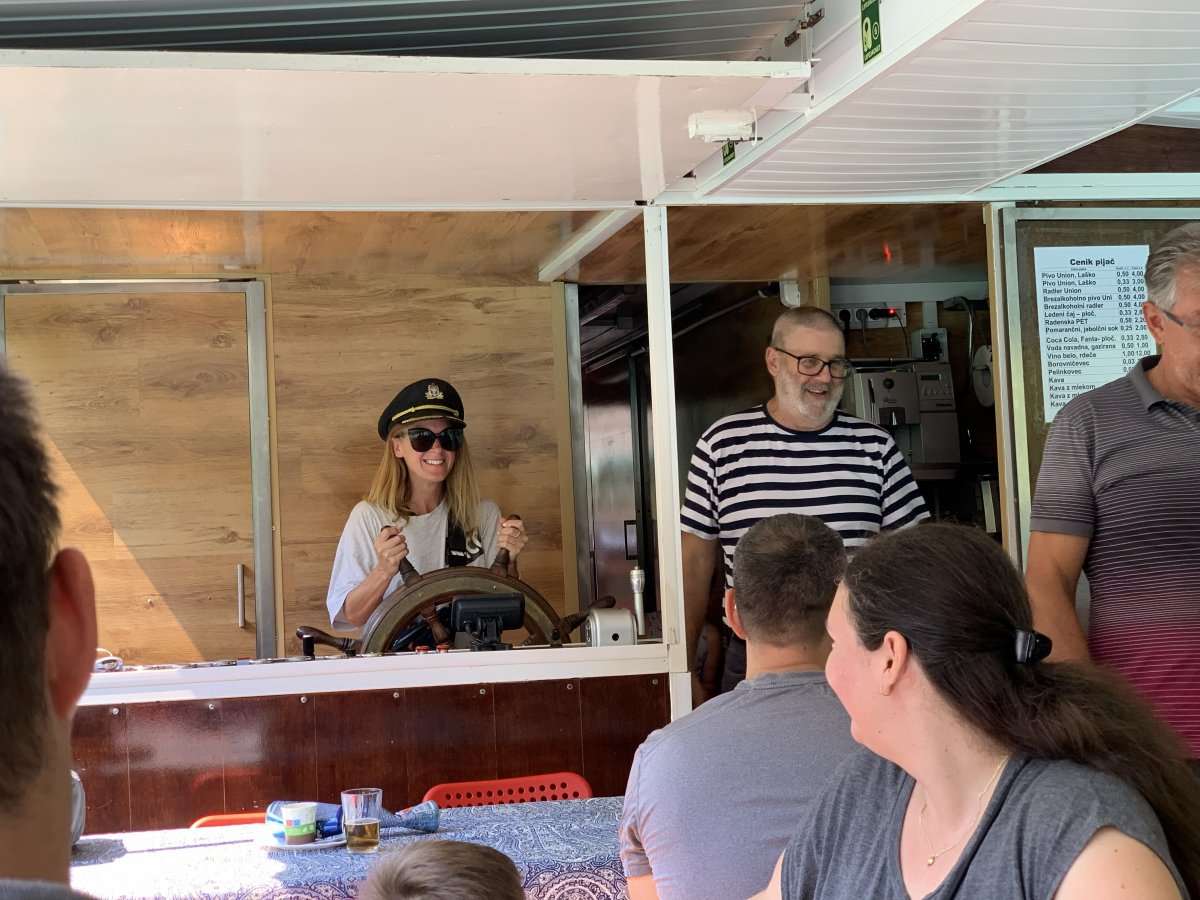 Mums and children get invited to drive the boat and wear the captain's hat..