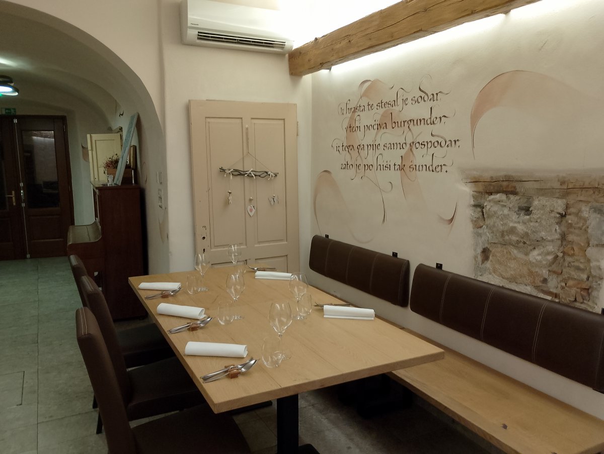 seating inside at Khrne has a warm wine cellar feel or you can sit outside by the river..