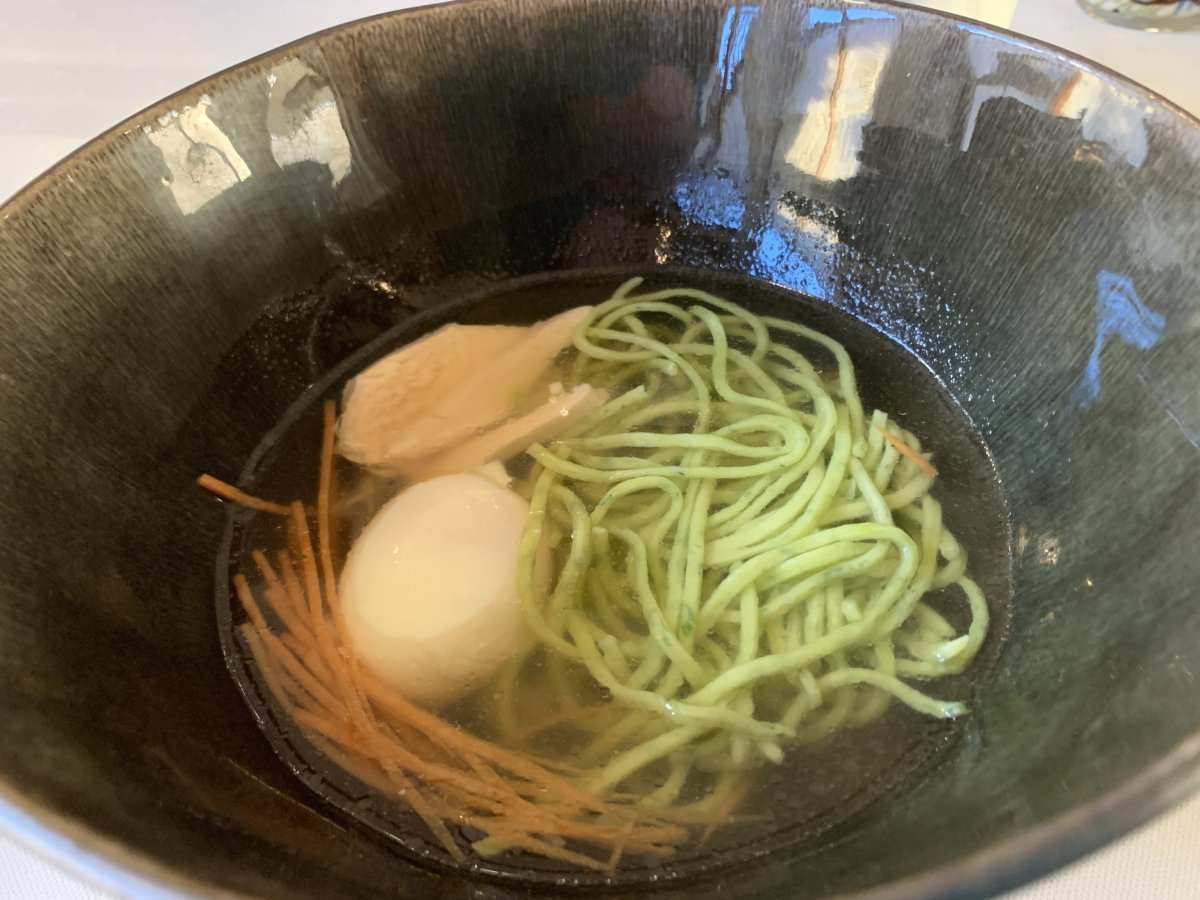 Chicken soup, poched egg, parsley noodles and chicken at Mahorcic..