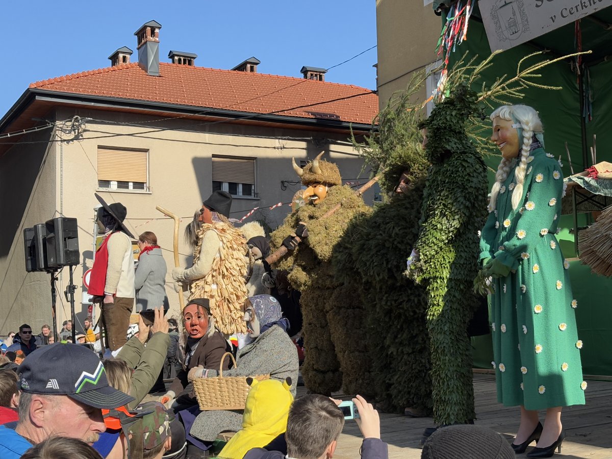 The Masks line up on stage waiting for the trial to begin..