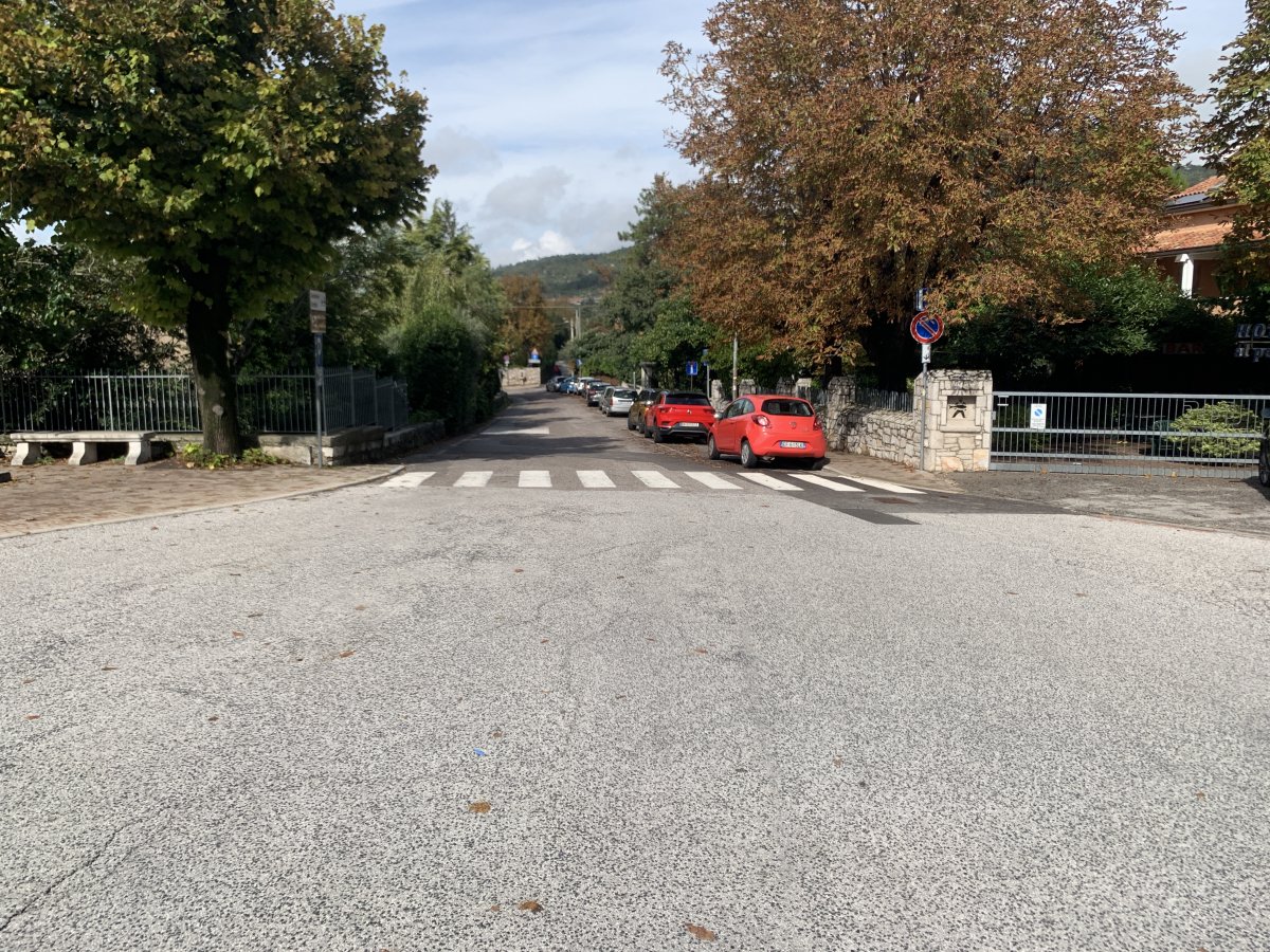 Try to find a parking spot in this side street..