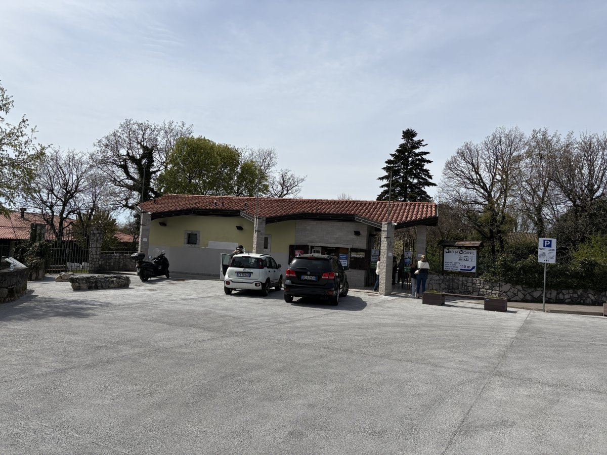 This is the car park and the EXIT of the cave with a little shop and summer cafe.. Park here and walk 5 mins to the Visitor Centre..